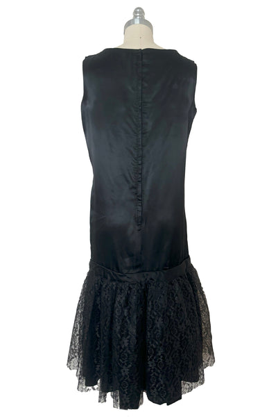 Back view of 1960s does 1920s vintage black satin and lace flapper dress costume, small to medium.