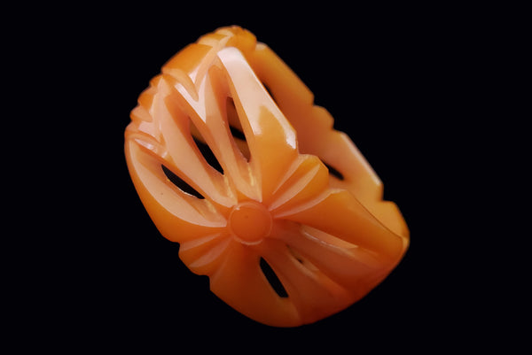 1990s Vintage Wide Carved and Pierced Orange Plastic Fakelite Bangle
