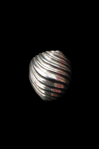 Vertical front view of 1980s vintage 925 sterling silver modernist wavy groove dome ring, size 8.25.