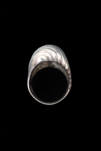 Vertical top view of 1980s vintage 925 sterling silver modernist wavy groove dome ring, size 8.25.