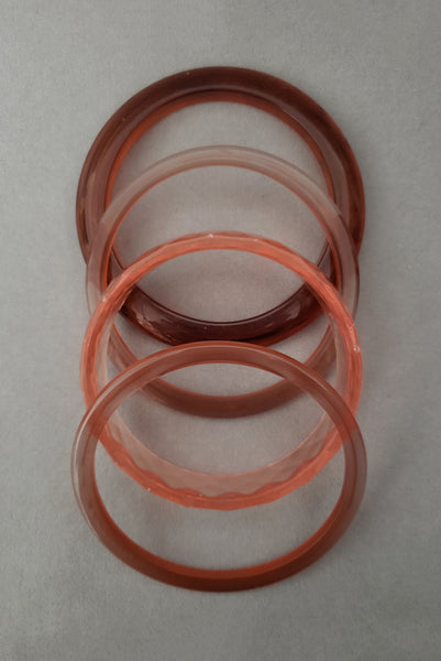 1980s Vintage Translucent Peach and Brown Four (4) Bangle Bracelet Set