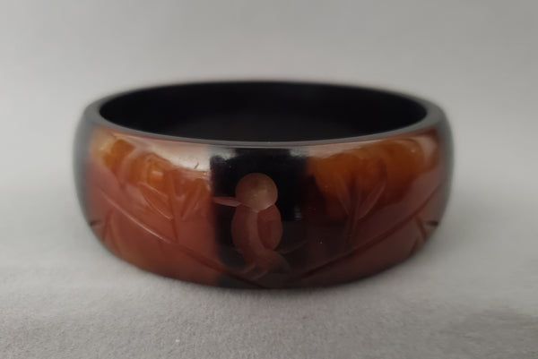 1940s Marbled Butterscotch and Brown Carved Black Overdyed Bird Bakelite Bangle