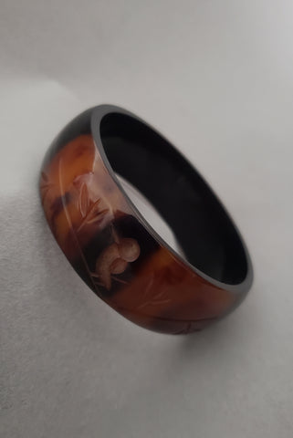 1940s Marbled Butterscotch and Brown Carved Black Overdyed Bird Bakelite Bangle