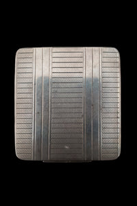 Vertical top view of 1920s vintage square silver tone stripe engraved make-up compact.