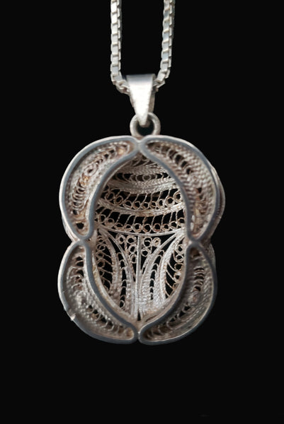 Detail back view of 1970s vintage silver filigree Egyptian scarab insect pendant on matching box chain.