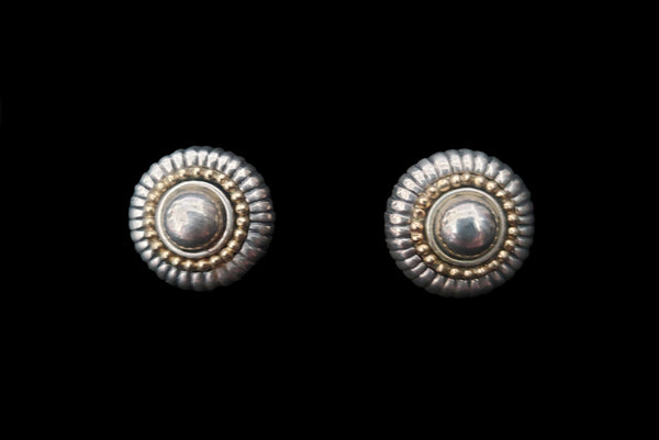 Horizontal front view of 1990s vintage Flli Menegatti 925 sterling silver and 14k gold round fluted tow-tone clip-on earrings.