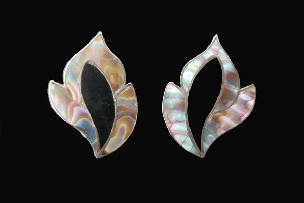 Horizontal front view of 1950s vintage inlaid abalone & onyx flame and 925 sterling silver screw back earrings.