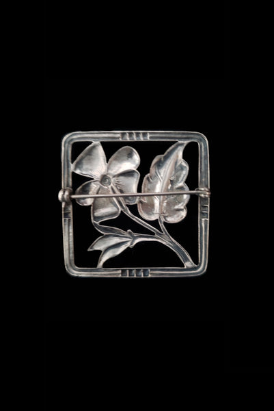 Vertical back view of 1950s vintage 925 sterling silver square flower brooch.