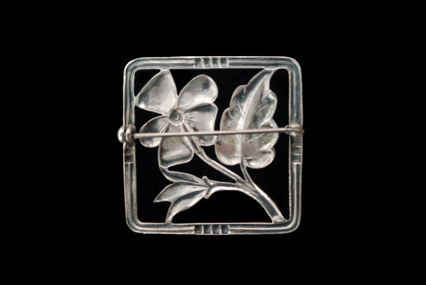 Horizontal back view of 1950s vintage 925 sterling silver square flower brooch.