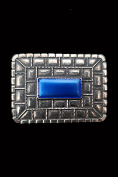 Vertical front view of 1960s mid century vintage modernist rectangular blue enamel 925 sterling silver and brooch.