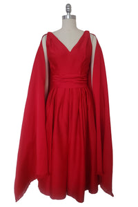Front view of 1960s vintage red duchess satin low back, wrapped waist, pleated skirt cocktail dress with shawl by Rappi, extra extra small to extra small.