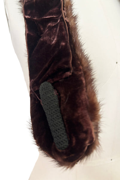 Detail view of 1950s vintage brown mink fur and velvet padded stand alone clip-on collar. Showing the brown velvet lining and covered metal clips.