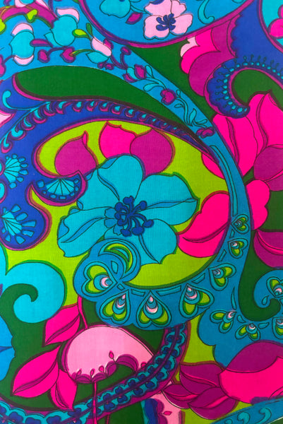 Fabric detail view of vintage 1960s blue, pink, purple, and green psychedelic floral print cotton shift dress, extra small to small.