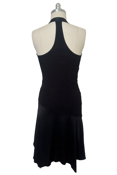 Back view of 1990s vintage black silk Lycra charmeuse and rayon jersey drop waist halter dress with handkerchief hem by Bebe, size small to medium. Showing the racerback.