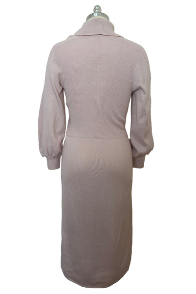 Back view of 1970s vintage blush pink turtleneck bishop sleeve acrylic polyester nylon blend sweater dress by JT Martin, size medium to large.