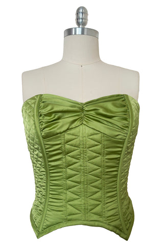 Front view of 1990s vintage peridot green quilted satin corset/bustier by John Festa, small to medium. New with tags.