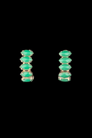 Vertical front view of 1950s vintage green marquise cabochon gold tone clip -on hoop earrings.