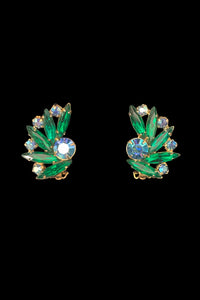 Vertical front view of 1950s vintage green marquise and blue iridescent round rhinestone fan shaped clip-on earrings.