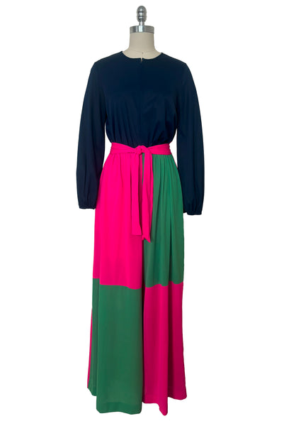 Front view of 1960s vintage navy, pink, and green nylon colorblocked jumpsuit by Gossard Artemis, small to medium.