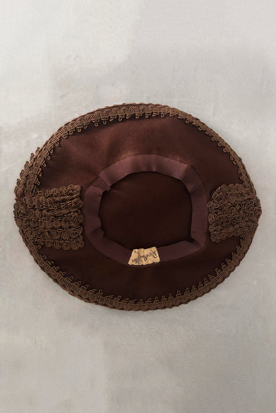 Vertical bottom view of 1940s vintage chocolate brown felt wide brim saucer hat trimmed in matching braid, by Dorothy Potter.