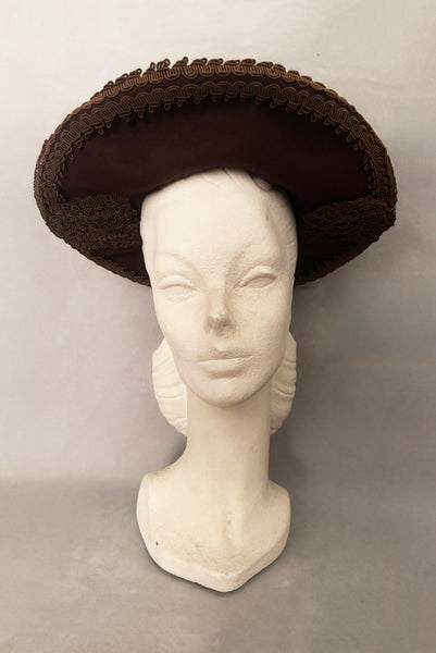 Vertical front view of 1940s vintage chocolate brown felt wide brim saucer hat trimmed in matching braid, by Dorothy Potter.