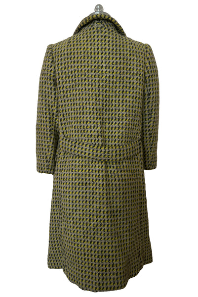 Back view of 1960s vintage citron yellow, gray, and white bracelet sleeve, knee length wool coat, by Paul Blumenstein, size small to medium. Showing the belted back.