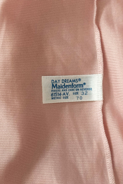 Interior detail view of 1970s vintage blush pink nylon tricot floral lace trimmed nightgown by Maidenform, size extra small to small. Showing the Day Dreams by Maidenform, size 32 label.