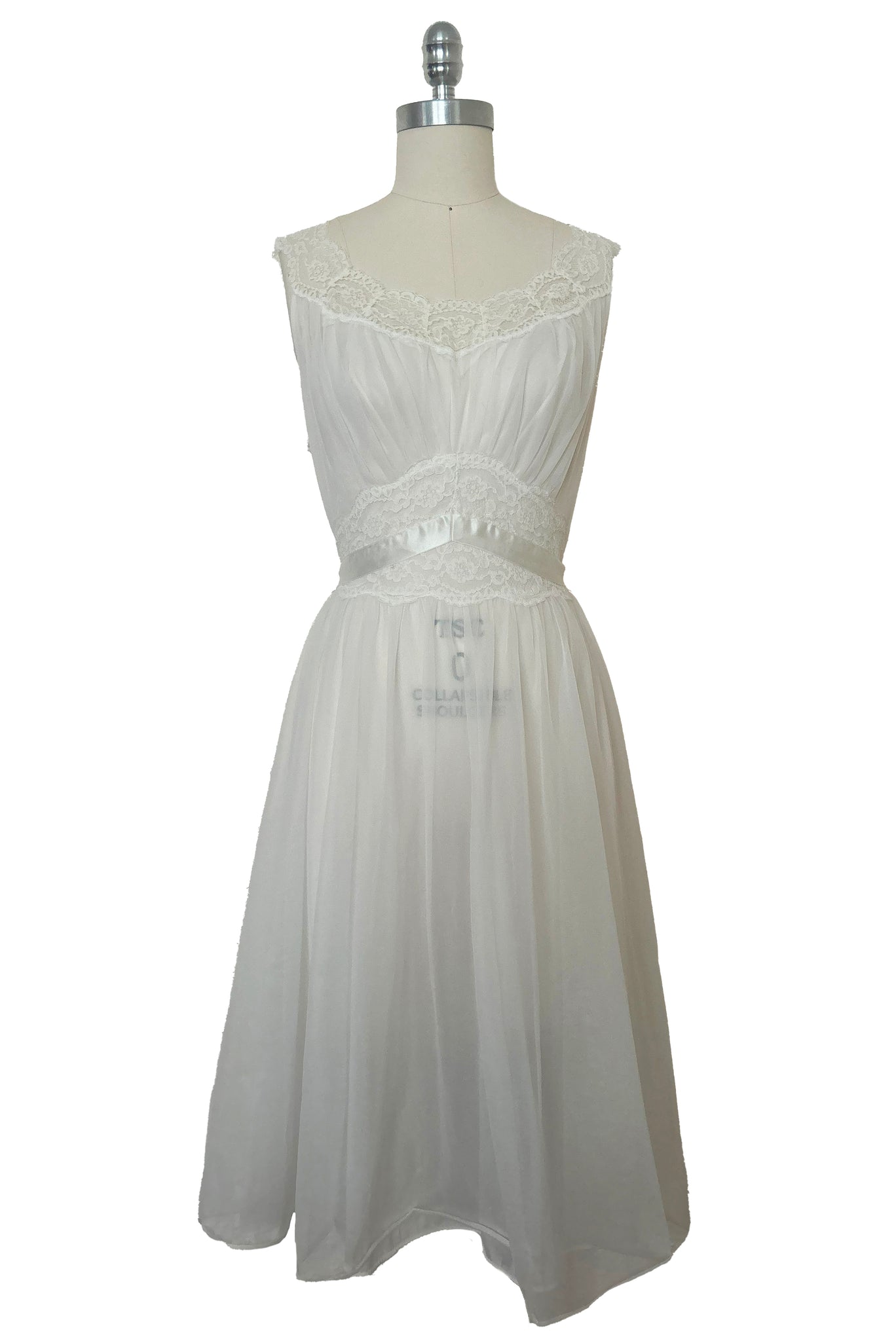 Front view of 1940s vintage white nylon bridal lingerie ballerina nightgown by Vanity Fair, size small to medium.