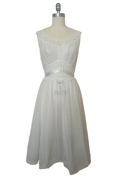 Front view of 1940s vintage white nylon bridal lingerie ballerina nightgown by Vanity Fair, size small to medium.