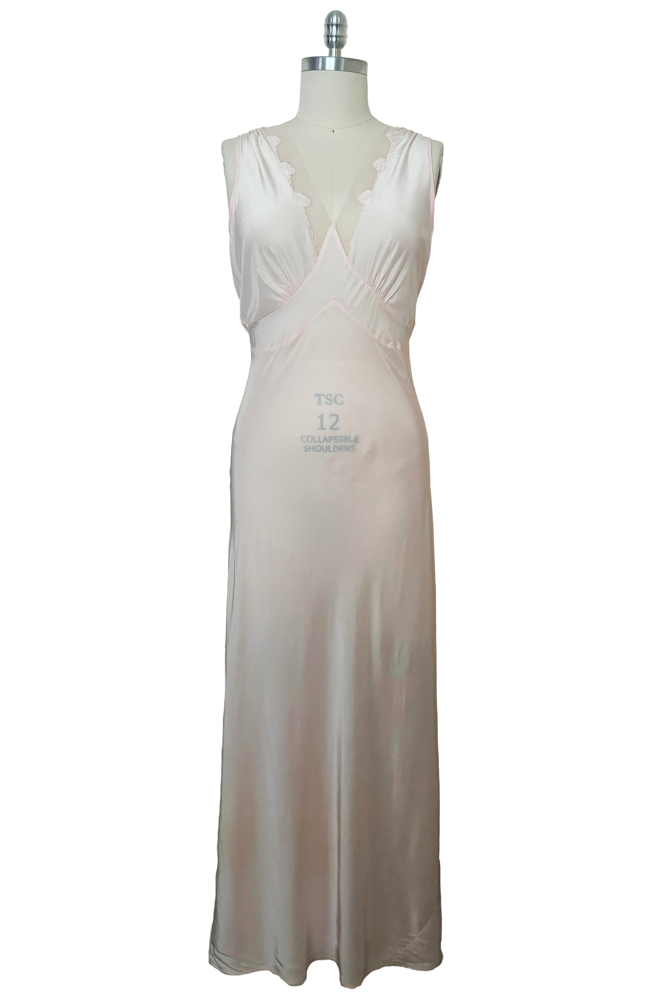 Front view of 1930s vintage blush pink rayon and mesh lingerie applique bias cut nightgown by Seamprufe, size small to medium.