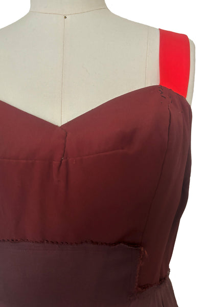 Detail view of 1960s vintage hot pink silk overblouse and brown silk chiffon two piece cocktail dress set, size extra small to small. Showing the dress with brown rayon sweetheart bodice and contrasting orange silk satin straps.