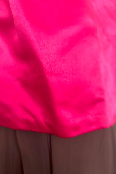 Detail view of 1960s vintage hot pink silk overblouse and brown silk chiffon two piece cocktail dress set, size extra small to small. Showing some snags in the silk satin.
