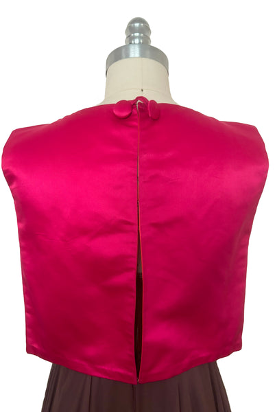 Overblouse back view of 1960s vintage hot pink silk overblouse and brown silk chiffon two piece cocktail dress set, size extra small to small.