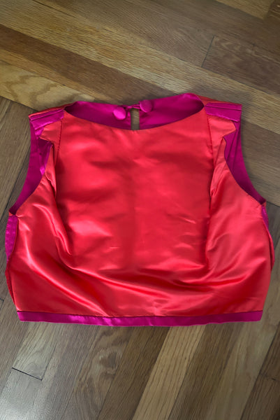 Interior detail view of 1960s vintage hot pink silk overblouse and brown silk chiffon two piece cocktail dress set, size extra small to small. Showing the interior construction details of the overblouse with the double sided hot pink and range silk satin. 