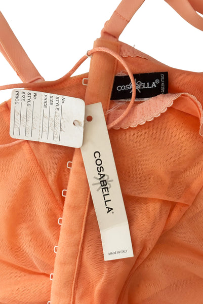Interior detail view of 2000s y2k vintage, as is, new with tags creamsicle orange mesh and green lace underwire bustier with laced back by Cosabella, size extra small to small. Showing the paper Cosabella and shop tags, as well as the stretched out elastic inside the bustier.