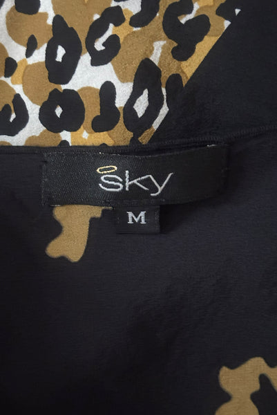 Interior detail view of 1990s vintage leopard animal print black silk and re embroidered lace camisole top by Sky, size extra small to small. Showing the Sky label and size M tag.