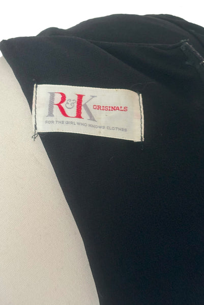 Interior detail view of 1950s vintage long sleeve, V-neck black crepe wiggle dress with triple stand self tie belt, by R&K Originals, small to medium. Showing R&K Originals label.