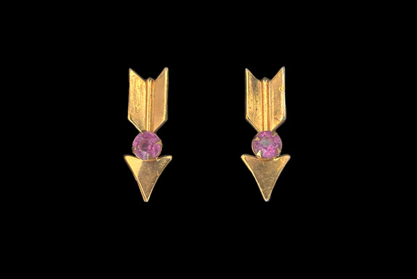 Horizontal front view of 1940s vintage round pink rhinestone and warm gold tone arrow screw back earrings by Coro.