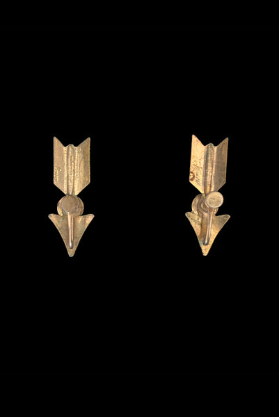 Vertical back view of 1940s vintage round pink rhinestone and warm gold tone arrow screw back earrings by Coro.
