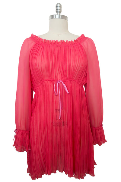 Front view of new with tags deadstock 2000s vintage y2k coral pink pleated, empire waist, long sleeve chiffon mini baby doll nightgown by Romance for Nk Imode, size large to extra large.
