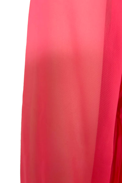 Detail view of new with tags deadstock 2000s vintage y2k coral pink pleated, empire waist, long sleeve chiffon mini baby doll nightgown by Romance for Nk Imode, size large to extra large. Showing a small pull in the chiffon.