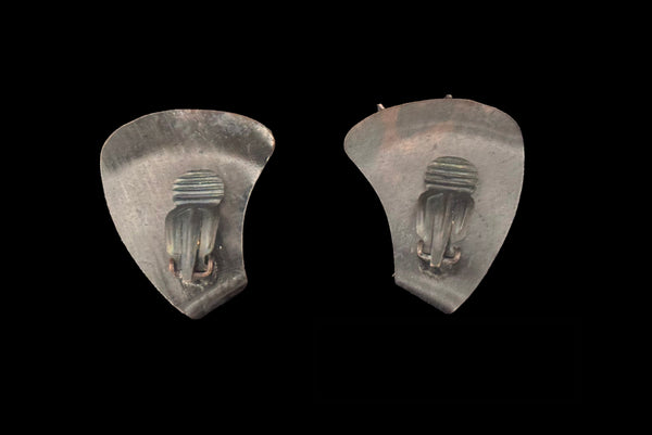 Horizontal back view of 1960s vintage darkened copper and iridescent marquise rhinestone botanical cattail clip-on earrings.