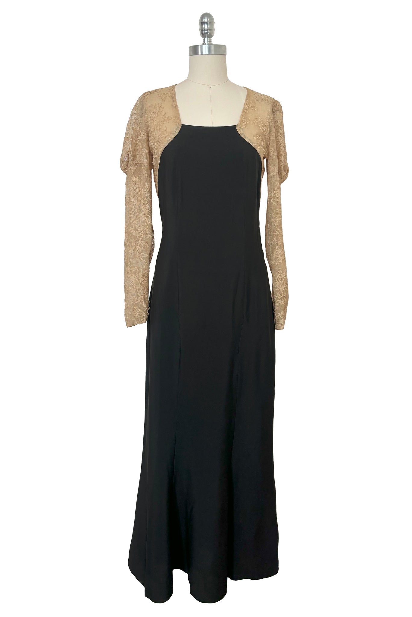 Front view of 1930s vintage cream lace sheer back Juliet sleeve square neck black crepe midi dress, size extra small to small.