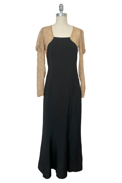 Front view of 1930s vintage cream lace sheer back Juliet sleeve square neck black crepe midi dress, size extra small to small.
