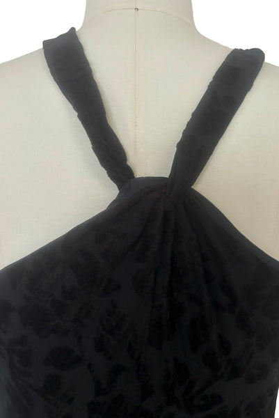 Bodice back view of new with tags 1990s vintage Art Deco style black floral burnout velvet knit maxi dress, by Kamisato, small to medium. Showing the racerback neckline and floral burnout fabric.