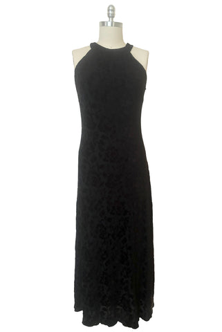 Front view of new with tags 1990s vintage Art Deco style black floral burnout velvet knit maxi dress, by Kamisato, small to medium.