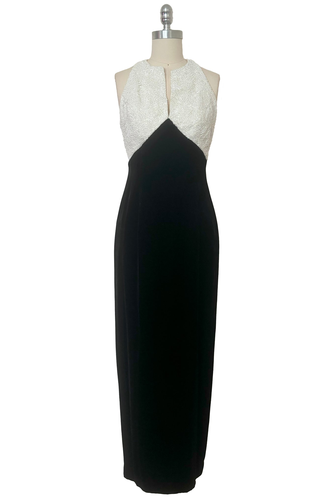Front view of 1990s vintage cream beaded satin halter neck & black velvet evening dress by Carmen Marc Valvo, extra small to small.