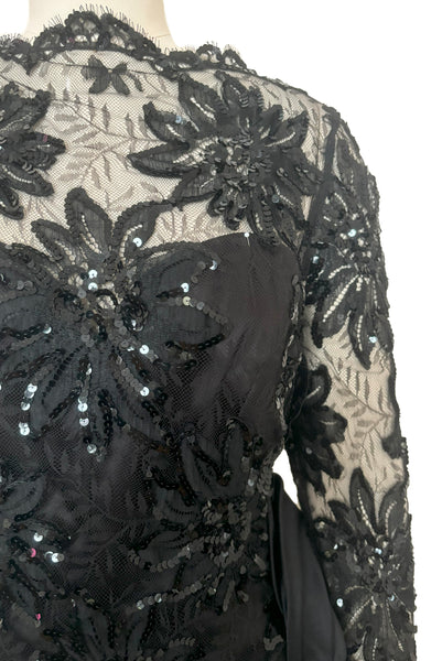 Bodice front detail view of 1980s vintage black satin, sequin lace, & dotted tulle asymmetrical cocktail dress by Mignon, small to medium. New with tags. Showing the floral lace & sequin overlay.