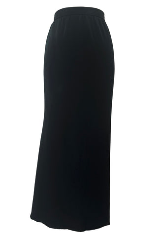Front view of 1990s vintage black silk maxi evening skirt with train by Fernando Pena, size extra small to small.