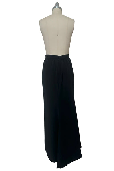 Back view of 1990s vintage black silk maxi evening skirt with train by Fernando Pena, size extra small to small.